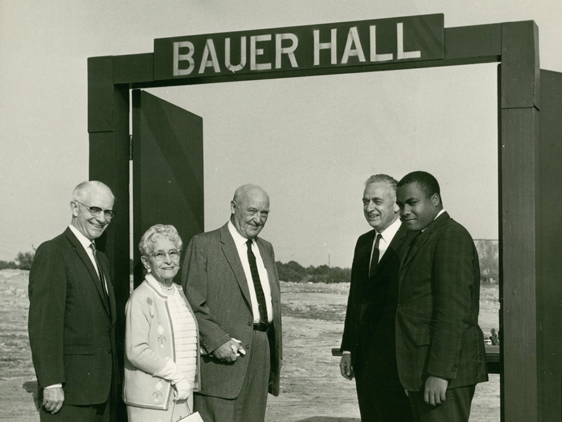 Trustees standing at groundbreaking for Bauer Hall.