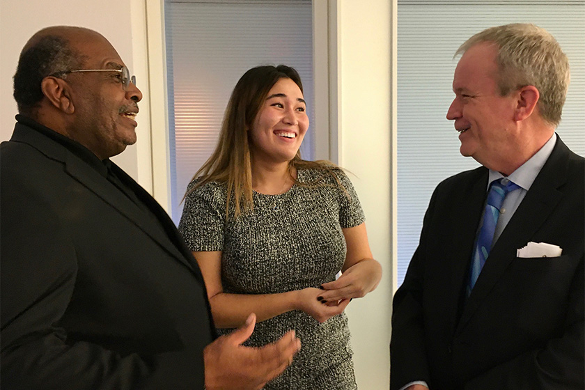 Ambassador C. Steven McGann (left), intern Sophia Grossman (center), and Larry Edward André Jr.
