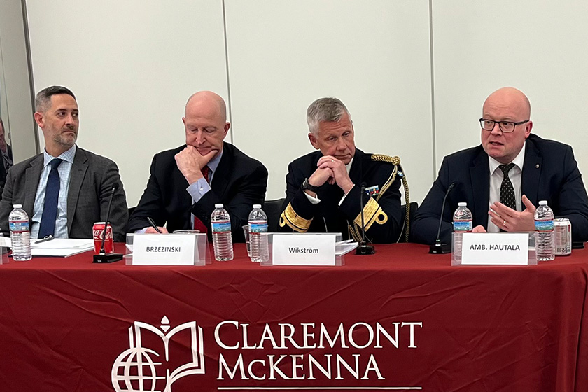 Four panelists at an Athenaeum discussion.