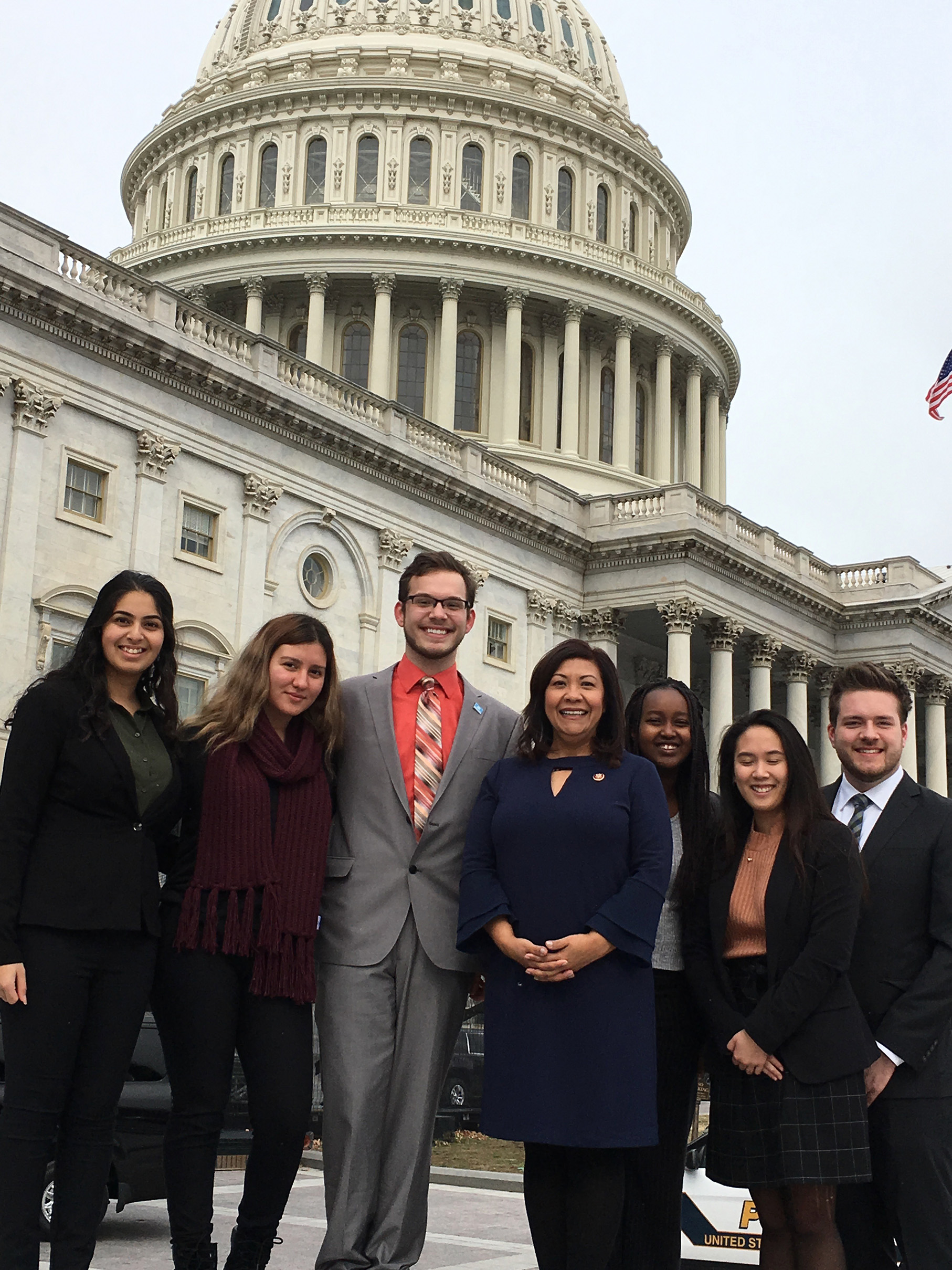 Spring 2019 interns in front of the Capital Building with Rep. Torres (center).