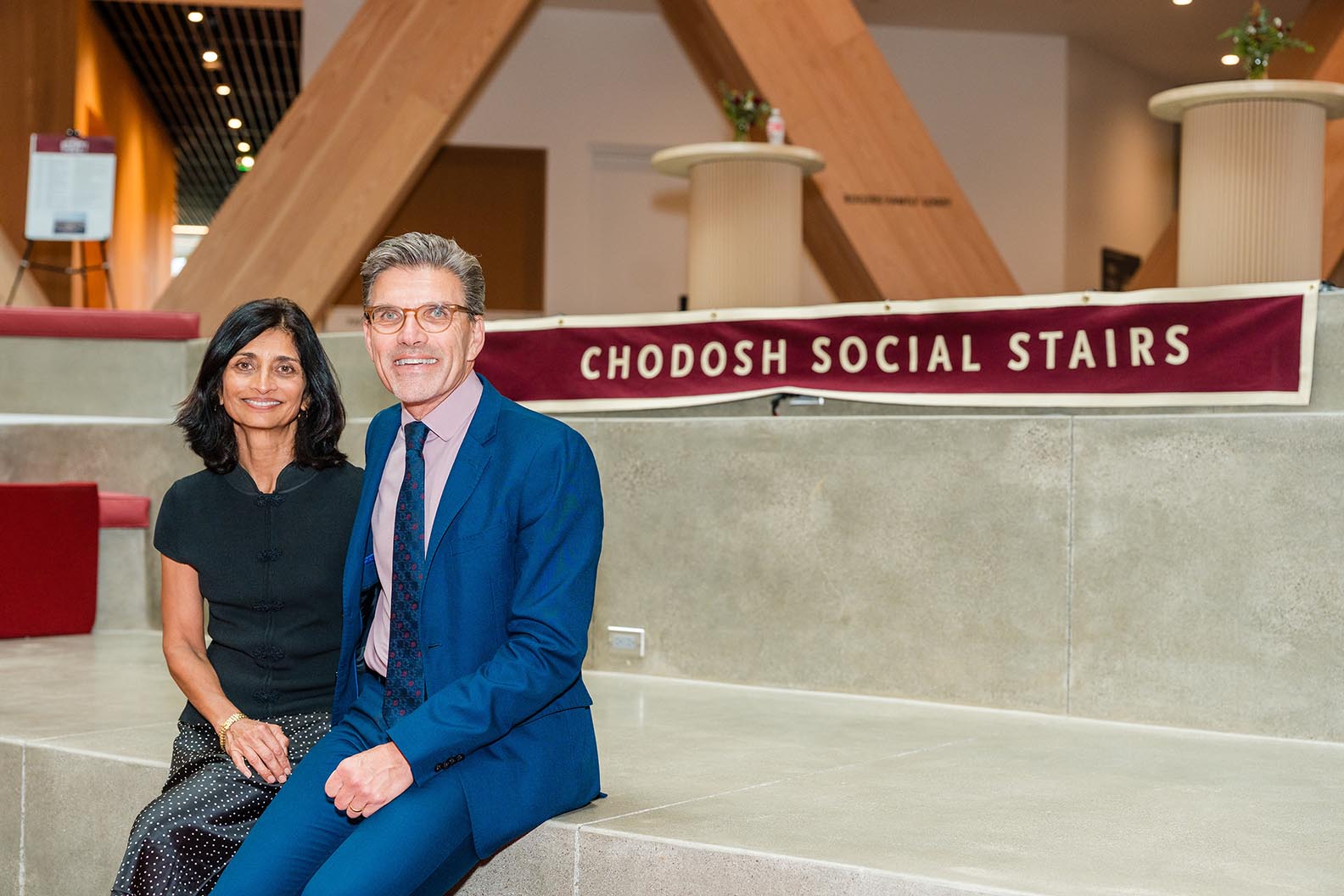 President Chodosh with Priya Junnar on the newly named Chodosh Social Stairs.