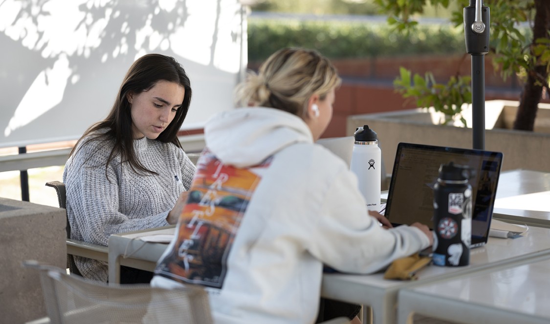 Students work at one of the many outdoor spaces provided by the college during the coronavirus pandemic.