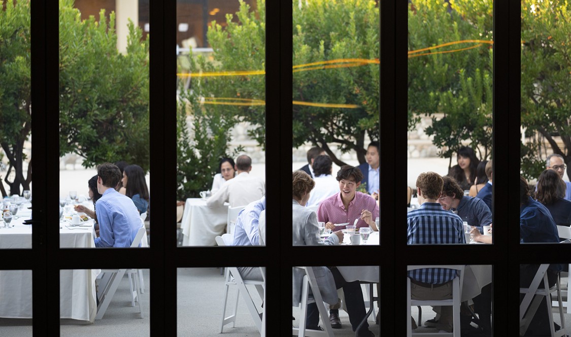 View of CMC’s first 75th Anniversary Distinguished Speakers event dinner in the patio from inside the auditorium.