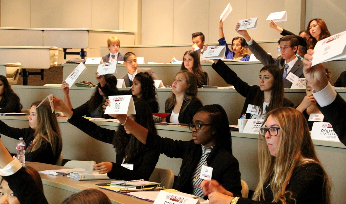 High school student delegates take part in the McKennaMUN Conference.