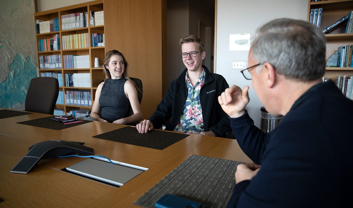 Professor meets with students