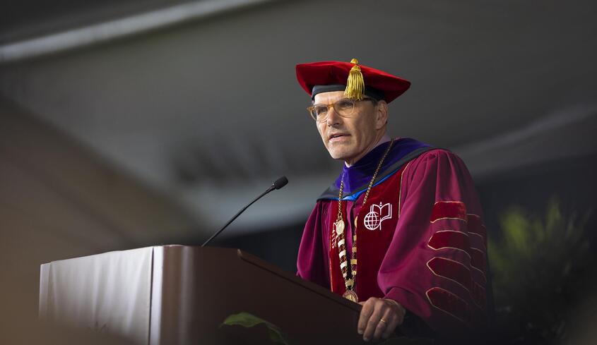 President Chodosh addressing the 2026 graduates at Commencement.