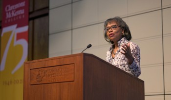 Anita Hill gives her Ath talk at the podium.