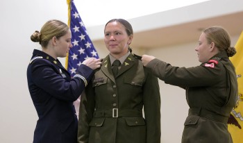 Cooper McKenna having her rank pinned on uniform