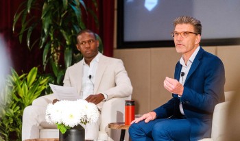 Antoine Grant ’07 (left) and President Hiram Chodosh at the Town Hall Q&amp;A during Alumni Weekend 2025.