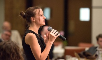 Student asking question at the Athenaeum