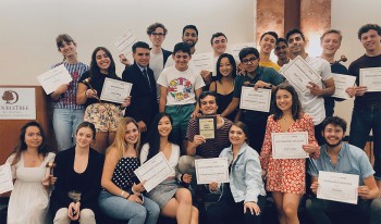 CMC Model UN team members holding their awards