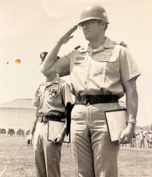 John Stanton ’68 saluting.