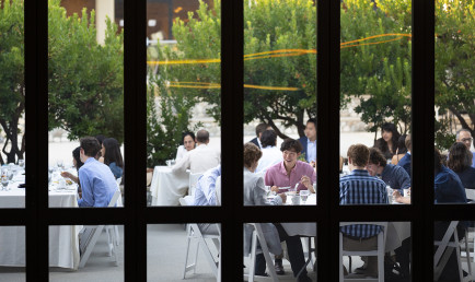 View of CMC’s first 75th Anniversary Distinguished Speakers event dinner in the patio from inside the auditorium.