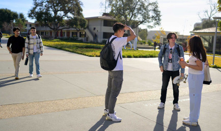 Campus shot of students going to class.