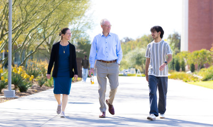 President-Elect Will Dudley and his wife touring the campus with a student.