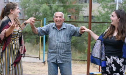 Anoush Baghdassarian and Ani Schug with a Syrian refugee