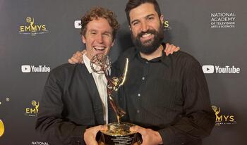 Chris Temple '12 and Zach Ingrasci '12 hold Sports Emmy