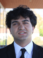 Male in business suit.